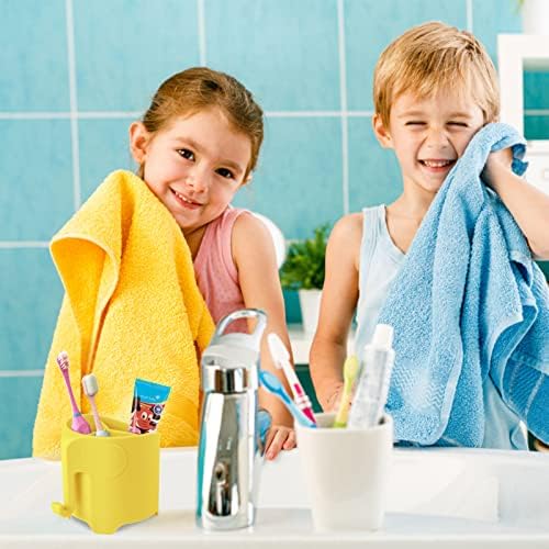 Organizing Kids Toothbrushes in a Funny Elephant Style Holder Yellow